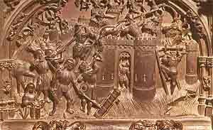 Detalle de la Guerra de Granada, en el coro de la catedral de Toledo. guiarte.com