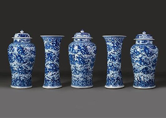 Garniture with scenes of West Lake, ca. 1700. China, Qing dynasty (1644-1911). Porcelain painted with cobalt blue under a transparent glaze. Albuquerque Collection