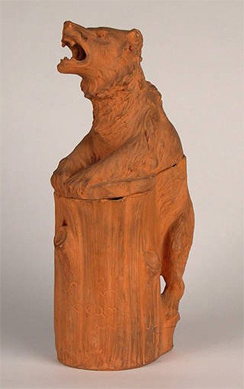 Terracotta tobacco jar and cover in the form of a bear. Lockwood Kipling. 1896.